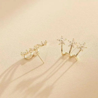 Doorgestoken oorbellen met drie bloemen